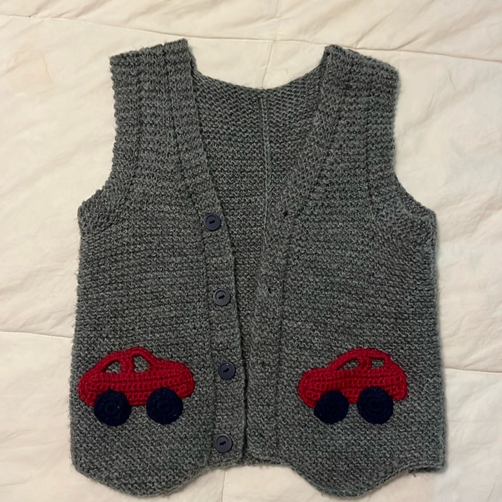 Sweater vest, hand knit in turkey with cute red cars